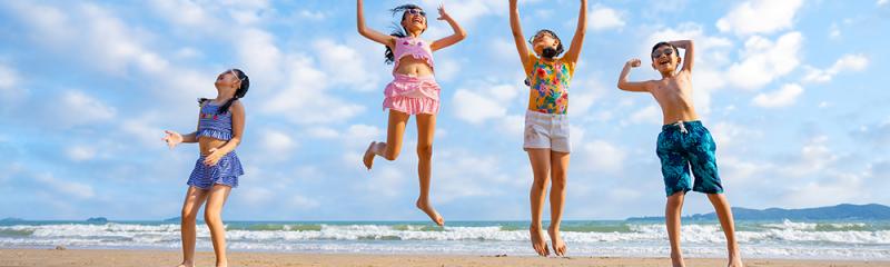 children playing at beach
